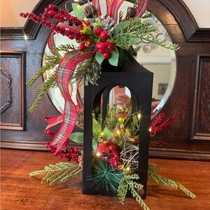 Festive Black Lantern with Red and Green Accents